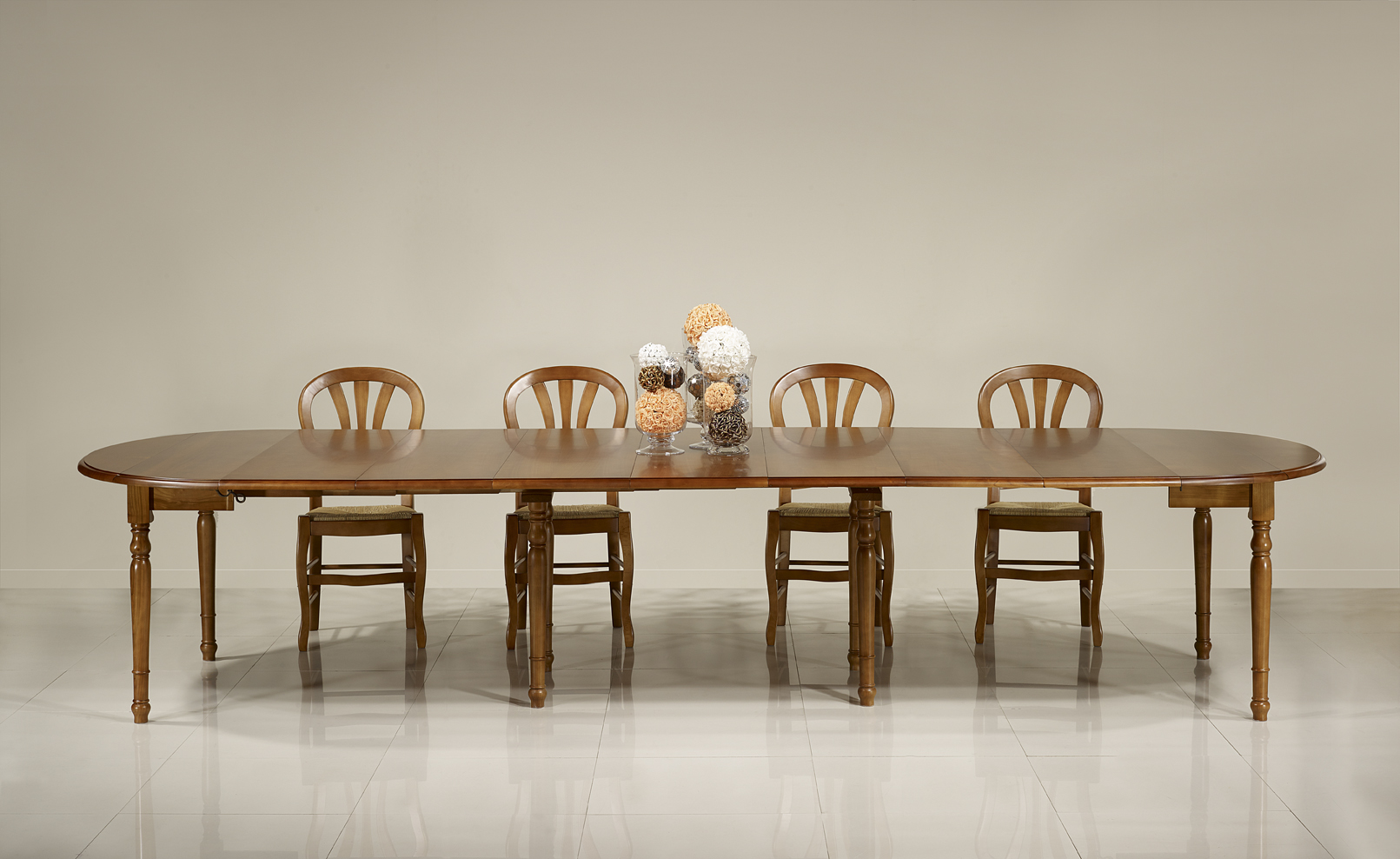 Table ronde à volets DIAMETRE 105  en merisier massif de style Louis Philippe 6 allonges de 40 cm